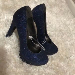 Size 6 1/2 sparkly blue pumps never worn